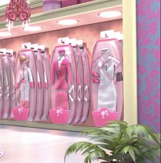 there are many pink and white items on display