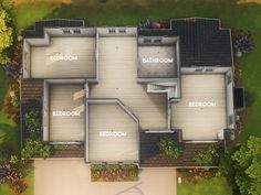 an aerial view of a three bedroom house