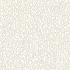 an animal print wallpaper pattern in beige and white, with small spots on it