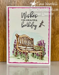 a birthday card with a wooden bench and butterflies on the back, which reads wishes for a beautiful birthday