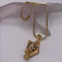 Chain And Pendant With Rhinestone Gold Plated Chain 22 Inches Gold Diamond Jeweled Necklace, Gold Iced Out Necklaces For Party, Gold Diamond Necklace With Jeweled Detail, Gold Iced Out Necklace For Party, Party-style Iced Out Gold Necklace, Gold Necklace With Diamond And Rhinestones, Gold Diamond Necklace With Rhinestones, Gold Rhinestone Pendant Necklace With Bling, Gold Crystal Rhinestone Necklace With Chain