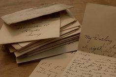 old messages that make you cry are piled on top of each other with handwritten letters