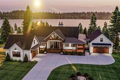 this is an artist's rendering of a house in the country side with lake and trees