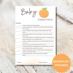 a baby shower game with an orange on it