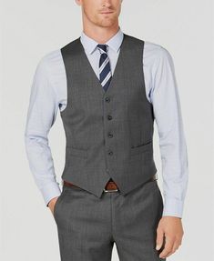 $215 Michael Kors 39L Men's Gray Blue Check Wool Classic Fit Suit Waistcoat Vest Description Embody the styling tastes of a true gentleman with the timeless appeal and magnificence of this three-piece gray check vest by Michael Kors. Matching its smart looks is the luxurious comfort offered by soft, natural stretch wool fabric. Vest: Five-button closure; two front pockets; half-back belt; fully lined Shell: wool; lining: polyester/viscose Dry clean Imported About Us We sell only 100% authentic c Business Vest With Welt Pockets For Fall, Winter Formal Vest For Business, Classic Business Vest For Winter, Classic Winter Business Casual Vest, Classic Wool Vest For Office, Classic Business Casual Three-piece Suit For Winter, Notch Lapel Business Vest For Fall, Classic Notch Lapel Vest For Winter, Classic Three-piece Suit For Business Casual In Winter