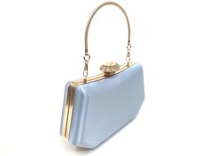 Evening bag made with handmade luxury baby blue satin and gold accessories. Perfect choice for wedding, dinner, cocktail, party and night parties etc... Suits any dress type. Perfect gift for bride, wife, mother, girlfriend, ladies. It will be a perfect piece that will complete your style. It is big enough to hold you things ( phone,  money, keys, cards, mini mirror, lipstick etc ). **SIZE - Width = 20 cm  /  7.8 inc - Height =  11 cm  /  4.3 inc - Depth = 5.5 cm  /  2.1 inc Shipping: You can have it in 3-4 days max. via UPS and FedEX Express to all over the world.   If you have any questions, please feel free to ask. Light Blue Rectangular Bag For Formal Occasions, Elegant Blue Bag With Pearl Handle, Elegant Light Blue Bags For Party, Light Blue Rectangular Evening Clutch, Elegant Light Blue Party Bags, Blue Clutch Bag For Wedding Guest, Elegant Light Blue Clutch For Evening, Elegant Light Blue Evening Clutch, Blue Rectangular Evening Bag For Wedding