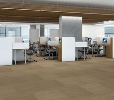 an office with multiple cubicles and desks