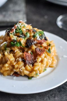 a white plate topped with macaroni and cheese