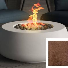 a fire pit sitting on top of a stone floor