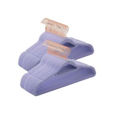 three pieces of purple plastic hangers on a white background