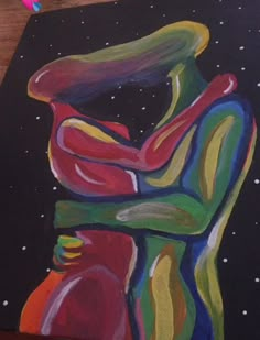 a painting of two people hugging each other on a black background with stars and dots