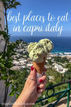 someone holding an ice cream cone with the words best places to eat in capri italy