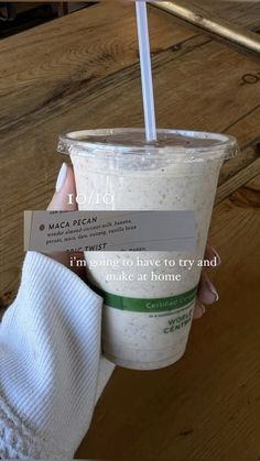 a person holding up a cup with a straw in it's hand and the caption reads, i am going to have to try and make at home