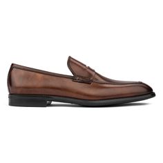 The Sicily cuts a new and bold silhouette amongst its slip on companions. It lends itself to dressier styles than other penny loafers. Wear with the Burnished Brown Belt.       * Stitched outsole      * Rubber sole and heel for traction      * Blake stitched construction      * Hand stitched vamp & beef roll      * Artisan crafted and polished calf leather Beef Roll, Formal Belts, Formal Accessories, Dressy Fashion, Shoe Tree, Brown Belt, Penny Loafers, Sicily, Hand Stitched