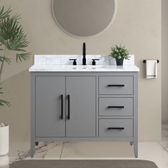 a bathroom vanity with two sinks and a mirror on the wall next to a potted plant