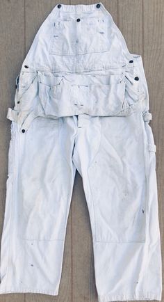 This is an authentic Sears Roebuck & co. 1950's  white  union made USA vintage bib overalls with awesome natural character  condition:  even though this one of the kind and amazing overall has some stains they  truly look awesome Made  USA waist                                   20" crutch to hem                   31" White Overalls With Pockets, White Bib Front Overalls With Pockets, White Utility Overalls With Pockets, Crutches, Bib Overalls, Union Made, Clint Eastwood, White Vintage, Gender Neutral