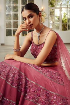 Mauve delicately embroidered lehenga in floral motifs. Comes with embroidered blouse and draped dupatta.
Component: 3
Pattern: Embroidery
Type Of Work: Sequins, beads, glass beads, crystals
Neckline: Square
Sleeve Type: Sleeveless
Fabric: Silk  Crepe, Net; Lining: Shantoon
Color: Purple
Other Details: 
Sequins, beads, glass beads, crystals
Note: The neckpiece worn by the model is not for sale
Occasion: Destination Wedding - Aza Fashions Purple Embroidery, Floral Lehenga, Embroidered Lehenga, Pattern Embroidery, Purple Silk, Fabric Silk, Silk Crepe, Floral Motifs, Embroidered Blouse