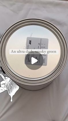 an ultra dark smoky green paint is being used to create a new look for the mirror