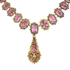 For Sale on 1stDibs - A demi-parure, 'parure' meaning 'adorn' in French, is a partial set of matching jewelry designed to be worn en suite. This incredible handcrafted pink Exquisite Pink Sapphire Jewelry, Elegant Pink Jeweled Necklaces, Elegant Pink Necklace With Jewels, Victorian Jeweled Necklaces For Formal Occasions, Formal Antique Pink Jewelry, Antique Pink Jewelry For Formal Occasions, Pink Jeweled Pendant Jewelry, Exquisite Oval Pink Jewelry, Pink Jewel Pendant Jewelry