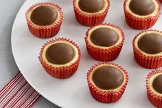 chocolates in red wrappers on a white plate