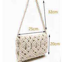 the measurements of a white purse with rope handles and handle, on a white background