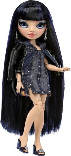 a doll with long black hair and blue eyes is holding a purse in her hand