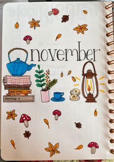 an open notebook with the words november written on it