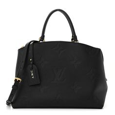 This is an authentic LOUIS VUITTON Empreinte Monogram Giant Grand Palais in Black. This shoulder bag is crafted of Louis Vuitton monogram-embossed calfskin leather in black. The bag features leather handles, an optional shoulder strap, and gold hardware. The top zippers open to a burgundy microfiber interior with zipper and patch pockets. Black Louis Vuitton, Louis Vuitton Empreinte, Louis Vuitton Totes, Louis Vuitton Damier Azur, Grand Palais, Louis Vuitton Damier Ebene, Louis Vuitton Shoulder Bag, Leather Handles, Luggage Tags