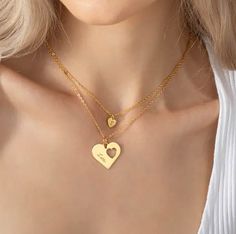 Cherished Bonds - Mother-Daughter Heart Necklace Set Unite Hearts with Elegant Style Heartfelt Connection - Discover the essence of maternal love with our Mother-Daughter Heart Necklace Set. This exquisite collection features two heart-shaped necklaces, meticulously crafted to symbolize the unbreakable bond between a mother and her daughter. It's not just jewelry; it's a tribute to love, making it an ideal accessory for mother-daughter moments. Sophisticated Elegance - Each heart pendant boasts a refined, elegant design, with a polished finish that exudes sophistication. Whether it's a casual day out or a special event, these necklaces add a graceful touch to any attire. Their delicate size ensures they're suitable for daily wear, subtly celebrating your connection. Personal Touch - Add a Engraved Necklace Mothers, Outfit Elegant, Lucky Charm Necklace, Wedding Gifts For Groomsmen, Promise Rings For Couples, Mothers Bracelet, Graduation Necklace, Heart Shaped Necklace, Photo Necklace