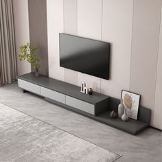 a living room with a large flat screen tv mounted on the side of it's wall