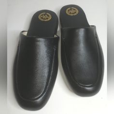 Black Leather Slippers In Excellent Condition. There Are A Few Spots On The Leather Inside From A Disinfectant Wipe, Otherwise They Look Unused. Black Synthetic Slippers With Leather Sole, Black Slippers With Leather Sole, Casual Black Mules For Business, Casual Black Business Mules, Classic Black Slippers With Rubber Sole, Black Slip-on Slippers For Work, Classic Black Closed Toe Mules, Classic Black Slippers For Office, Formal Black Closed Toe Slippers