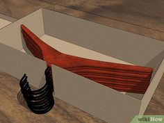 an open cardboard box with red sheets in it