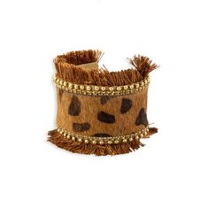 The Wide Hair-On Hide Band Of This Cuff Sets A Wonderful Mood, All Trimmed With Faux Pearls And Fringe. A Delightful, Fun Cuff Bracelet Leather ,Iron Metal,Polyester Thread & Cotton Fabric Length 2.75"Diameter Brown Cuff Bracelets As Fashion Accessory, Brown Cuff Bracelet As Fashion Accessory, Trendy Brown Cuff Bracelet, Travel Charm Bracelet, Metal Cuff Bracelet, Denim Jewelry, Open Cuff Bracelet, Bag Jewelry, Beaded Cuff Bracelet