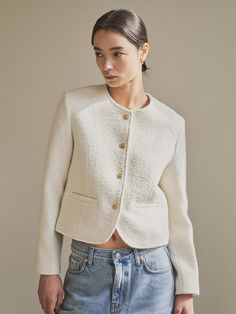 This is a jacket with a classic tweed feel. A material with a tightly woven boucle texture was used, and a silk interlining was added inside to create a sturdy finish. The details were simplified and the focus was on materials and silhouette, and it was finished luxuriously with 24K plated gold buttons.- The hem line is designed in a round shape for a feminine and elegant look.- Mix and match with colorful innerwear- Neat silhouette with round neck without collar*The color of the product is closer to the actual color in the detailed cut than in the cut worn by the model due to lighting. There may be slight differences in color depending on the type of monitor and environment. Estilo Kardashian, Boiled Wool, Clean Air, Tweed Jacket, Wool Jacket, M S, We Need, Fitness Models, Cotton Fabric