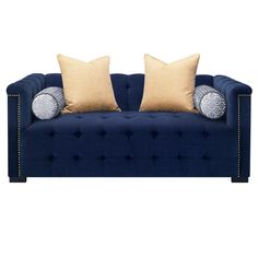 a blue couch with two pillows on it's back and one pillow sitting on top