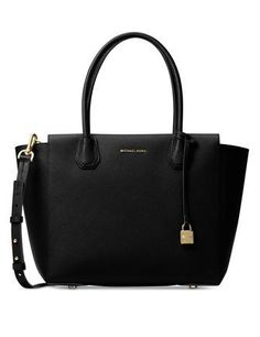 Classic sophistication translates into practical polish with spacious Mercer satchel. Made from luxuriously textured pebble leather, the Mercer can be worn on your arm by its double handles, or as a crossbody or shoulder bag by its long, slim detachable strap.Pebble leather; lining: polyesterLarge sized bag; 17-1/2"W x 11"H x 6-1/2"D7-1/2"L double handles; 17"L-19-1/2"L adjustable and detachable strapTop-zip closureExterior logo, feet and lock charm1 interior zip pocket and 1 slip pocketLaptop c Sac Michael Kors, Trendy Purses, Michael Kors Mercer, Mk Handbags, Cheap Michael Kors, Womens Designer Handbags, Trendy Handbags, Black Leather Bags, Purses Michael Kors