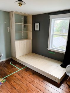 a room that is being remodeled with wood flooring