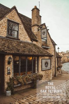 the royal oak tetbury is located on an old cobblestone street in england