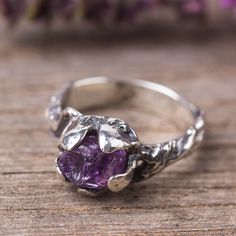 "Raw Amethyst ring in sterling silver. This witchy branches - free form shaped ring is rough in shape but also delicate. The stone is unpolished Amethyst crystal hold by an abstract flower shaped stone setting. * Size and details: The ring width on the front side - 0.3\" (9mm) The ring width on the back side - 0.1\" (4mm) Material: Sterling silver and raw genuine purple Amethyst. Because of the nature of uncut stones, every stone is unique, your ring will vary slightly from the one picture, what Witchy Ring, Witchcraft Jewelry, Raw Amethyst Ring, Antique Style Jewelry, Witch Rings, Mushroom Ring, Tree Ring, Cleaning Silver Jewelry, Tree Rings