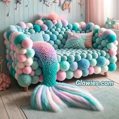 a couch made out of balls and mermaid tails