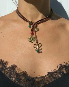 image 0 Bohemian Beaded Necklace With Adjustable Cord, Adjustable Hippie Flower Jewelry, Hippie Brown Choker Jewelry, Handmade Lariat Choker As Gift, Bohemian Lariat Choker With Adjustable Length, Bohemian Lariat Choker As Gift, Hippie Style Brown Choker Jewelry, Handmade Brown Bohemian Choker, Bohemian Adjustable Lariat Choker