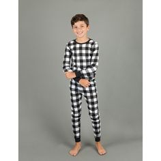 The Kid’s Two Piece Cotton Pajamas are the ideal outfits for matching with the rest of the comfy family. Each product comes with a two-piece set featuring a long-sleeved shirt and comfy bottoms, both utilizing ribbed cuffs at the ankles and wrists to bolster the overall slim feeling. Pajamas come made with cozy cotton material to complement the convenient tagless labels, perfect for those nights of lounging around the house. Wearers can choose many unique designs to bring out their best fashion, Holiday Long Sleeve Cotton Sets, Holiday Long Sleeve Sets For Fall, Black Cotton Long Sleeve Sleepwear, Black Long Sleeve Cotton Sleepwear, Holiday Fall Sets With Long Sleeves, White Sleep Sets For Fall, Casual Long Sleeve Christmas Sets, Casual Christmas Loungewear Set, Winter Black Crew Neck Sets