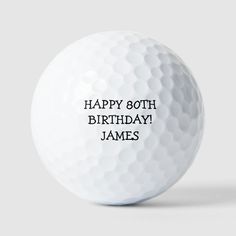 a white golf ball with the words happy 80th birthday james on it