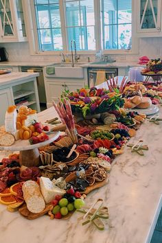 a kitchen counter covered in lots of different types of food on it's sides