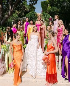 a group of women standing next to each other