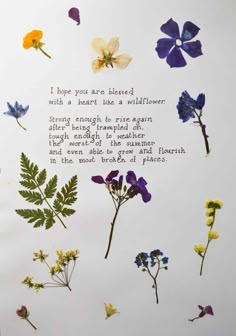 flowers and leaves are arranged in the shape of a poem