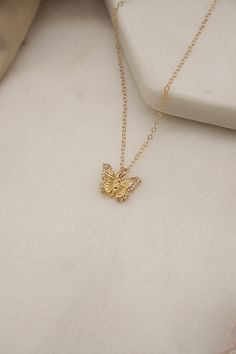 Details: - 14K Gold Filled Cable  - Pendant size: 14x10mm - Pendant material: 18K Gold Plated over copper and Cubic Zirconia - Earrings material: 18K Gold Plated over copper and Cubic Zirconia You can click the link below for other butterfly necklace: https://mikukumi.etsy.com/listing/795474104/gold-butterfly-necklace-simple-necklace Each item is individually placed on our MIKUKUMI leather card & cotton pouch. Gold Jewelry With Butterfly Charm For Gift, Gold Jewelry With Butterfly Charm For Her, Delicate Gold Butterfly Necklace As Gift For Her, Dainty Gold Butterfly Jewelry, Dainty Gold Plated Butterfly Jewelry, Dainty Gold Plated Jewelry With Butterfly Charm, Gold Butterfly Necklace For Gift, Gold Necklace With Butterfly Charm As Gift For Her, Gold Plated Butterfly Necklace As Gift