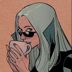 a woman with green hair and sunglasses drinking from a cup