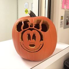 a pumpkin with a face carved into it