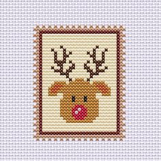 a cross stitch pattern with a deer's head on it